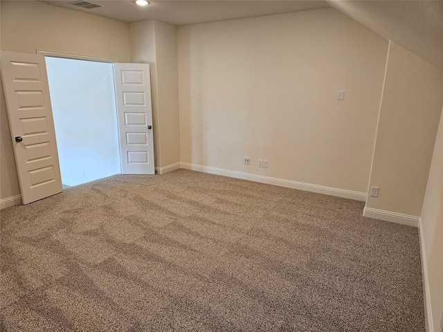 interior space with carpet, visible vents, baseboards, and recessed lighting