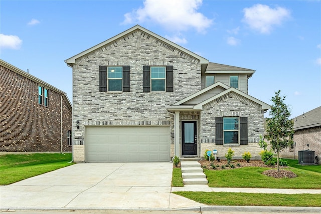 view of front of home with brick siding, concrete driveway, central AC, a garage, and a front lawn