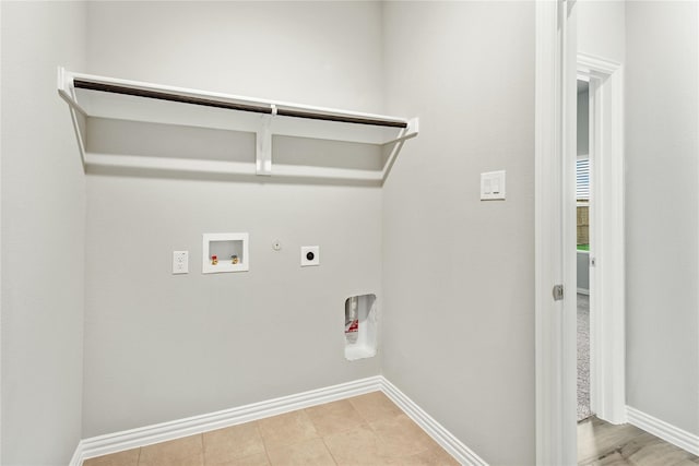 laundry room with hookup for a washing machine, hookup for a gas dryer, hookup for an electric dryer, laundry area, and baseboards