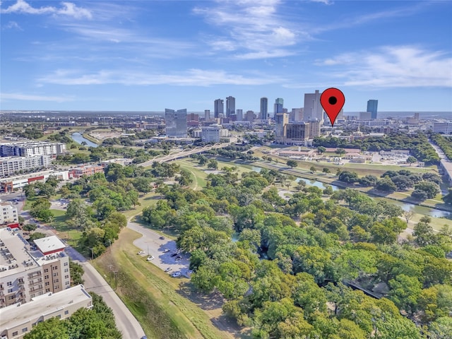 aerial view featuring a view of city and a water view