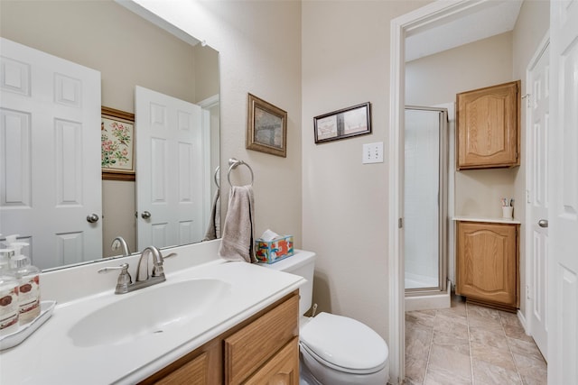 full bath with toilet, a stall shower, and vanity