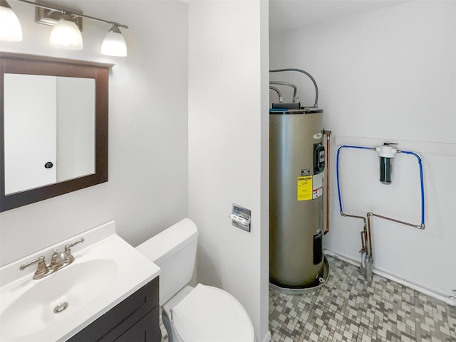 half bathroom featuring toilet, tile patterned floors, vanity, and electric water heater