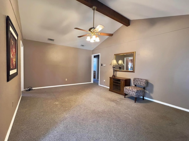 unfurnished room with carpet, vaulted ceiling with beams, visible vents, ceiling fan, and baseboards