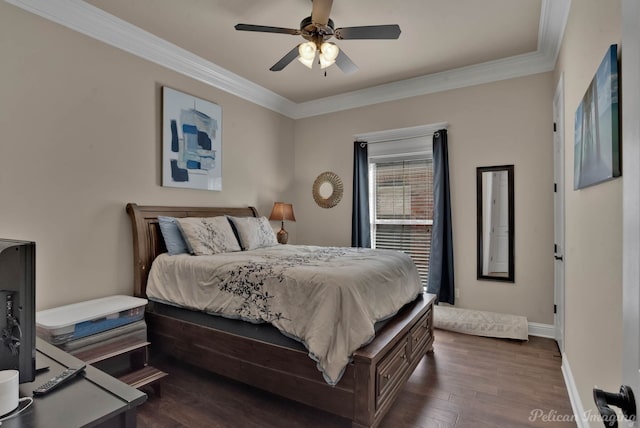 bedroom featuring a ceiling fan, baseboards, ornamental molding, and dark wood-style flooring