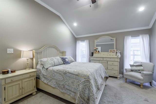 bedroom with crown molding, a ceiling fan, light carpet, vaulted ceiling, and baseboards