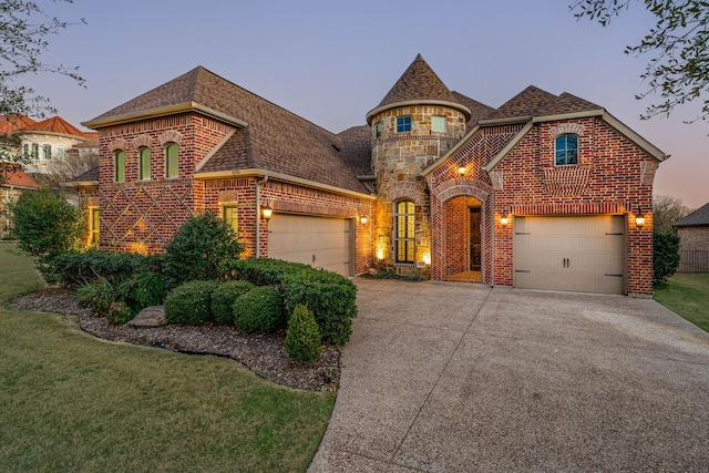 6055 The Resort Blvd, Fort Worth, TX 76179 - french country style house featuring brick siding, concrete driveway, a shingled roof, an attached garage, and a front yard