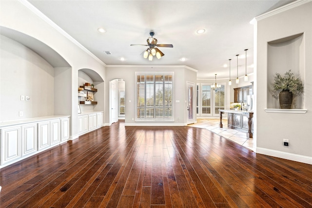 6055 The Resort Blvd, Fort Worth, TX 76179 - unfurnished living room featuring ceiling fan, wood-type flooring, a chandelier, baseboards, and recessed lighting