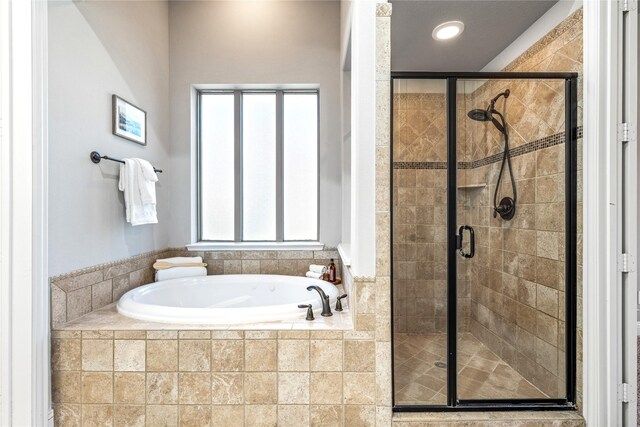 6055 The Resort Blvd, Fort Worth, TX 76179 - bathroom with a bath, a stall shower, and healthy amount of natural light