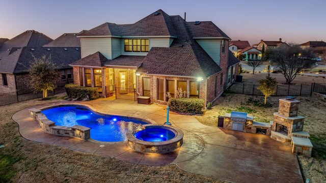 6055 The Resort Blvd, Fort Worth, TX 76179 - view of swimming pool with a fenced backyard, a patio area, and a pool with connected hot tub