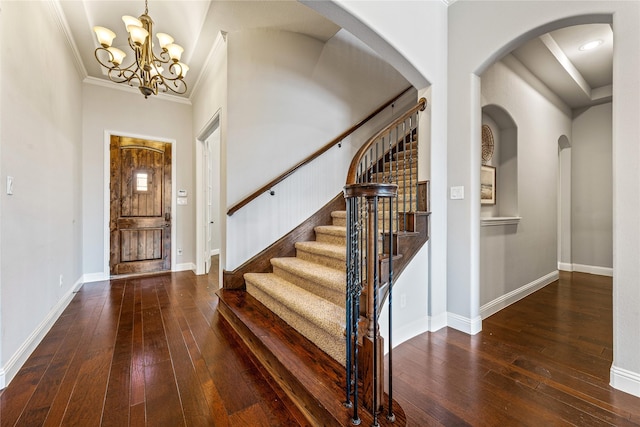 6055 The Resort Blvd, Fort Worth, TX 76179 - entrance foyer with wood-type flooring, stairs, a chandelier, baseboards, and ornamental molding