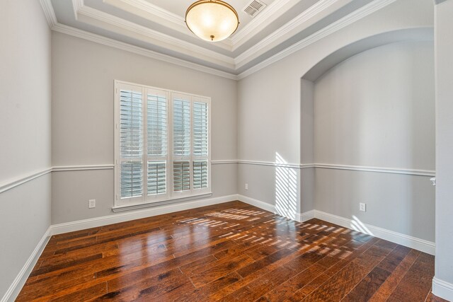 6055 The Resort Blvd, Fort Worth, TX 76179 - unfurnished room featuring hardwood / wood-style floors, ornamental molding, a tray ceiling, baseboards, and arched walkways