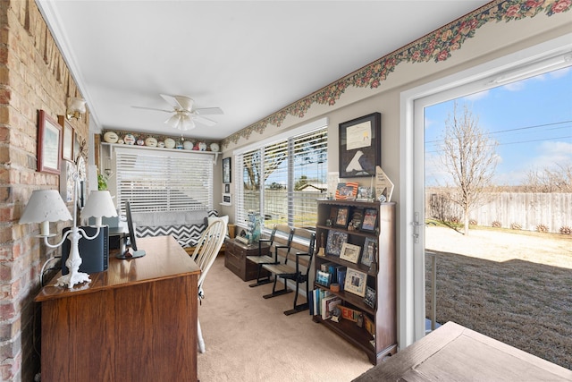 office with carpet flooring and a ceiling fan