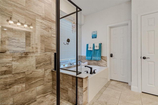 full bathroom featuring a bath and a shower stall