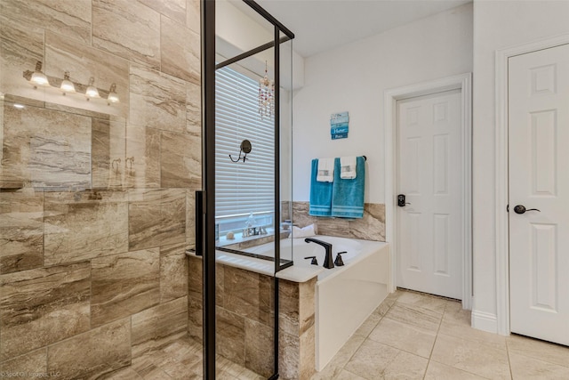 full bath featuring a wealth of natural light, a stall shower, and a bath