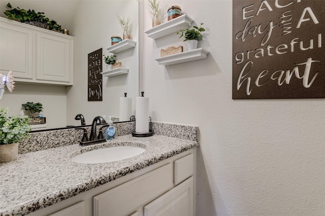 bathroom featuring vanity