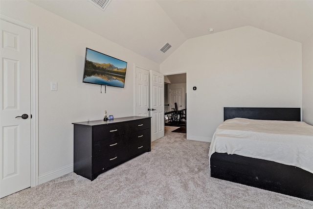 bedroom featuring light carpet, vaulted ceiling, visible vents, and baseboards