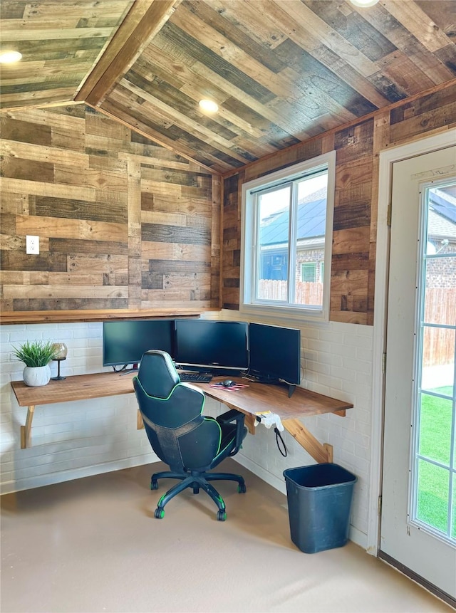 6025 Pine River Ln, Fort Worth, TX 76179 - home office featuring built in desk, wooden walls, wood ceiling, and lofted ceiling
