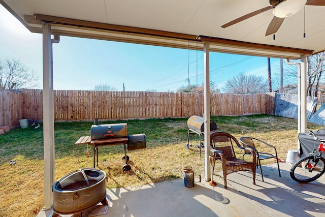 view of patio with a ceiling fan and a fenced backyard