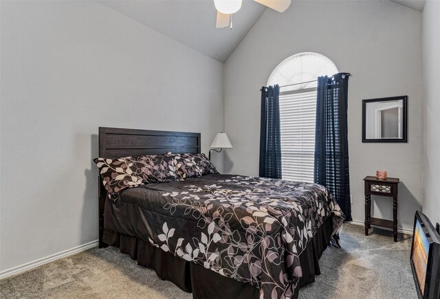 carpeted bedroom with lofted ceiling, ceiling fan, and baseboards