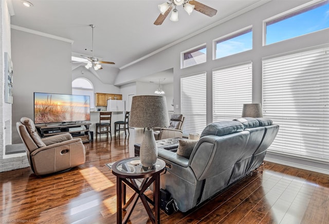 8502 Linda Vista Dr, Rowlett, TX 75088 - living room with a ceiling fan, ornamental molding, plenty of natural light, dark wood-type flooring, and high vaulted ceiling
