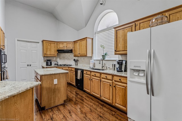 8502 Linda Vista Dr, Rowlett, TX 75088 - kitchen with white refrigerator with ice dispenser, dishwasher, dark wood-style flooring, tasteful backsplash, and a kitchen island