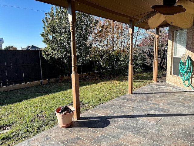 view of patio / terrace featuring a ceiling fan and a fenced backyard