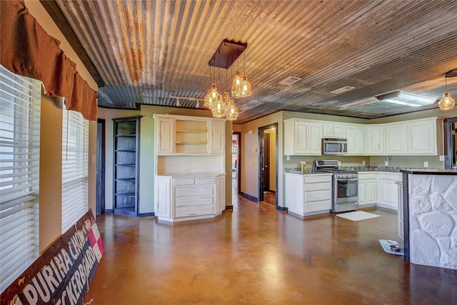 kitchen with stainless steel appliances, a chandelier, finished concrete flooring, and white cabinetry