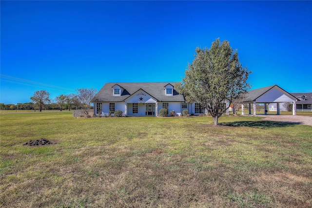 view of front of property featuring a front lawn and a gazebo