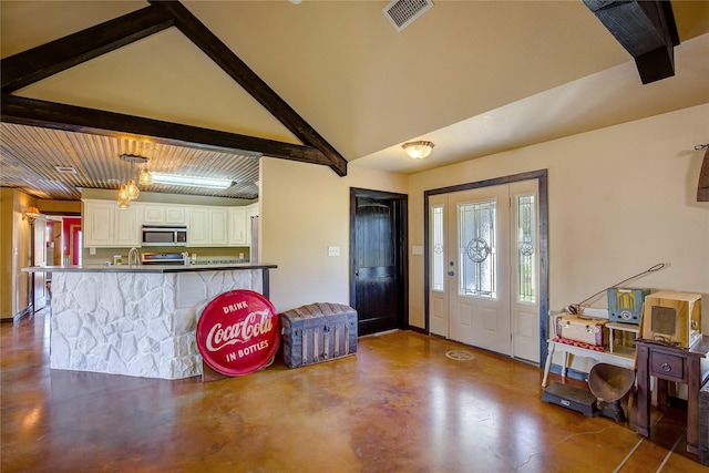 143 Rs County Road 1412, Point, TX 75472 - entryway with concrete floors and beam ceiling