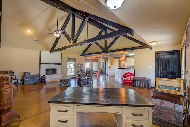 kitchen with dark countertops, visible vents, a fireplace, high vaulted ceiling, and ceiling fan