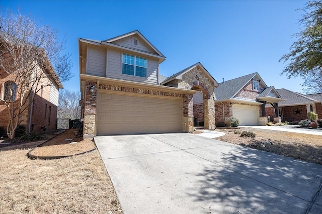 traditional-style home with stone siding and driveway