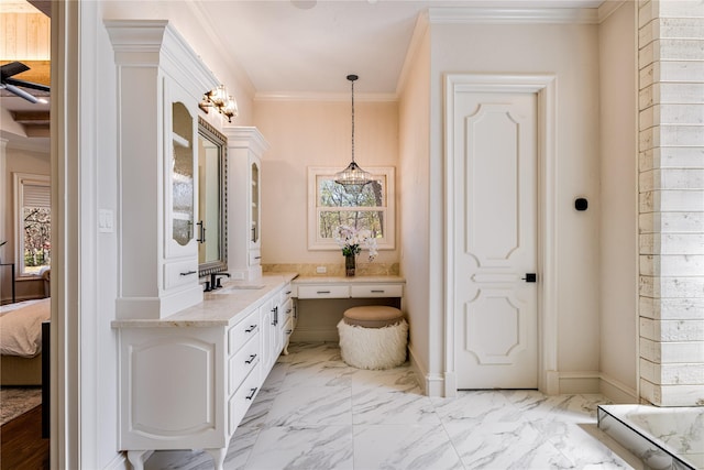 1717 Buckingham Dr, Keller, TX 76262 - full bath with ensuite bath, vanity, crown molding, marble finish flooring, and baseboards
