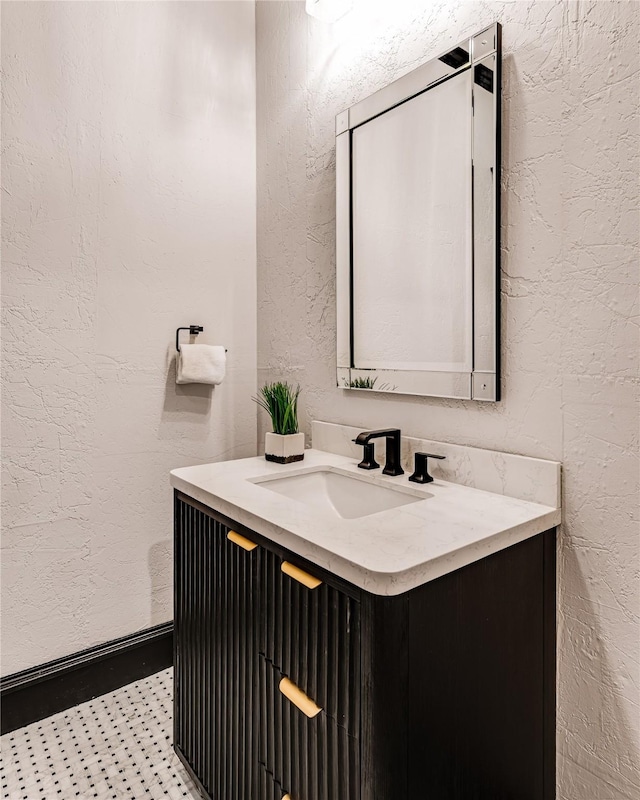 1717 Buckingham Dr, Keller, TX 76262 - bathroom featuring a textured wall, vanity, and tile patterned floors
