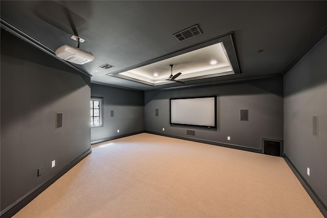 1717 Buckingham Dr, Keller, TX 76262 - carpeted home theater room featuring a tray ceiling, a ceiling fan, and baseboards