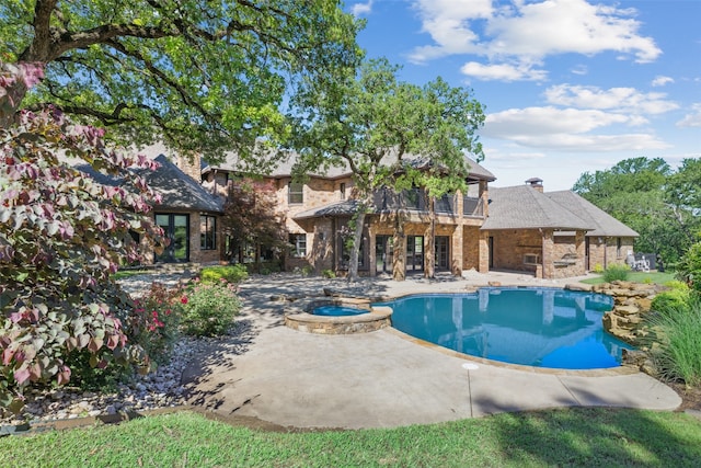 1717 Buckingham Dr, Keller, TX 76262 - view of swimming pool featuring a patio and a pool with connected hot tub