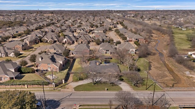 birds eye view of property with a residential view