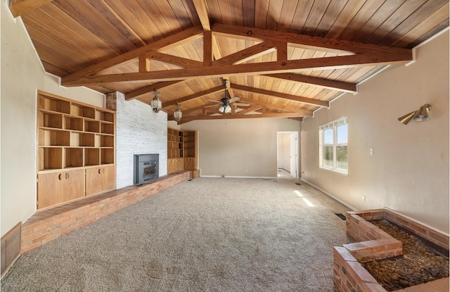 unfurnished living room featuring vaulted ceiling with beams, carpet floors, visible vents, and wood ceiling