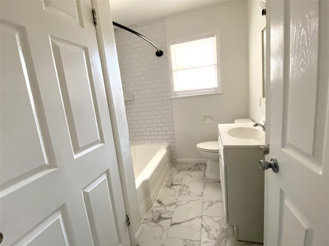 full bath featuring toilet, marble finish floor, shower / bathing tub combination, and vanity