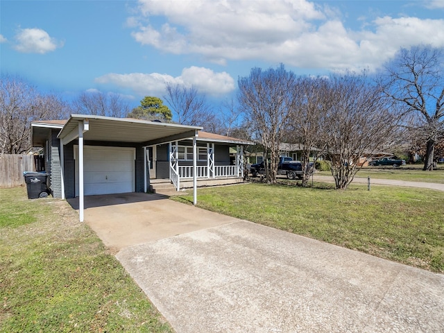 ranch-style house with a porch, a garage, driveway, and a front lawn