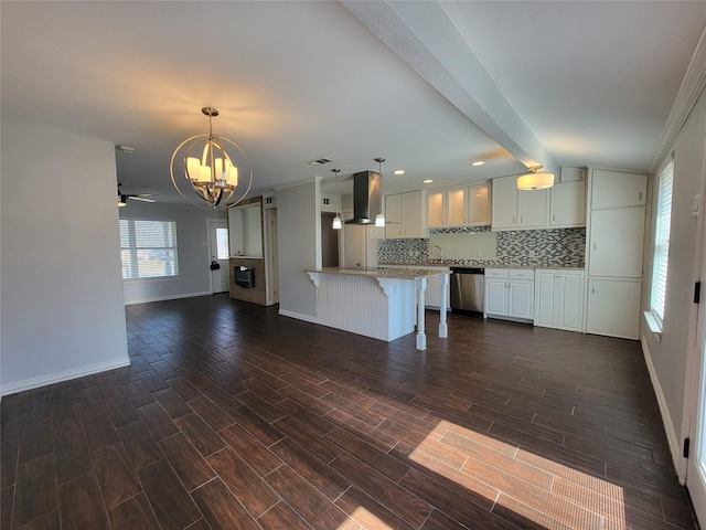 kitchen featuring island range hood, a breakfast bar, open floor plan, wood tiled floor, and stainless steel dishwasher