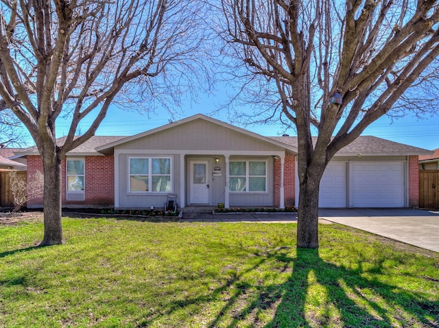 ranch-style house with brick siding, a front lawn, and fence