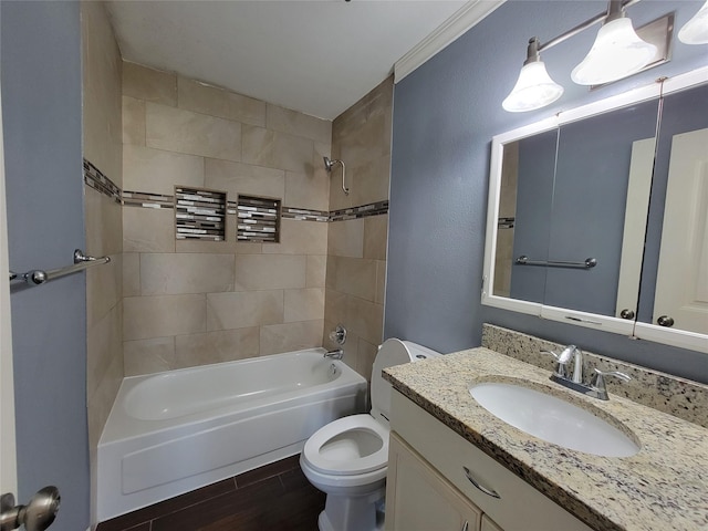 full bathroom with  shower combination, vanity, wood finished floors, and toilet