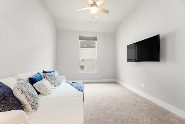 living room featuring carpet, visible vents, baseboards, and a ceiling fan