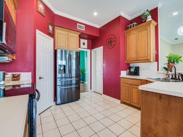 kitchen with range with electric stovetop, visible vents, ornamental molding, a sink, and stainless steel fridge with ice dispenser