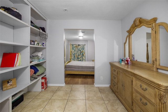 interior space with light tile patterned floors