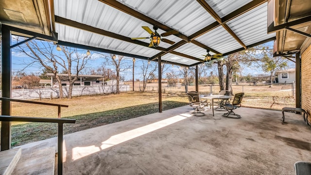 view of patio / terrace featuring outdoor dining area, a fenced backyard, and ceiling fan