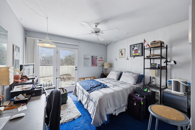 bedroom with ceiling fan and access to outside