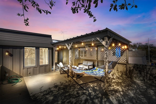 patio terrace at dusk with a deck