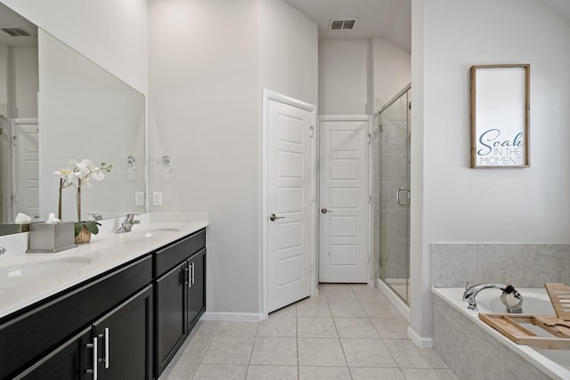 bathroom with a stall shower, visible vents, a sink, tile patterned flooring, and a bath