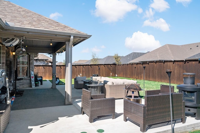 view of patio with outdoor lounge area and a fenced backyard